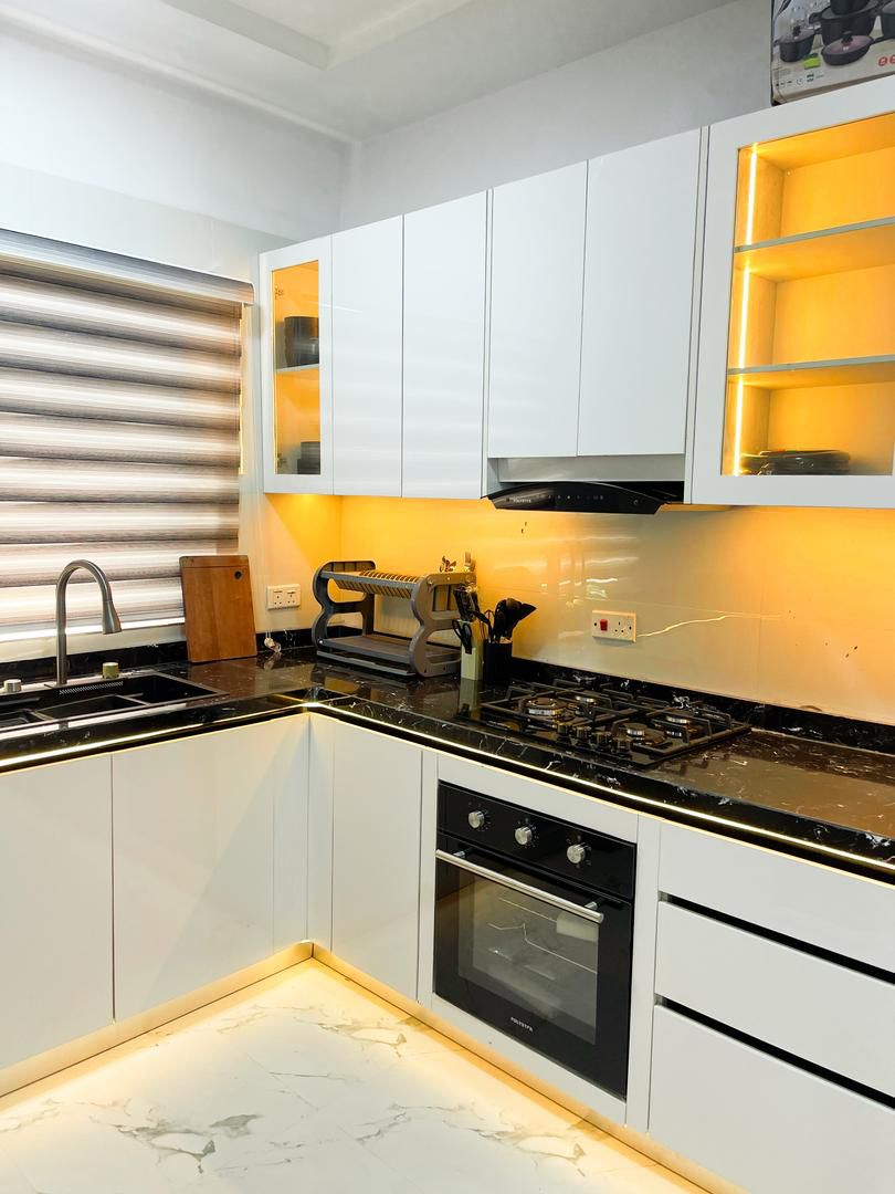 Modern fully-equipped kitchen in a service apartment